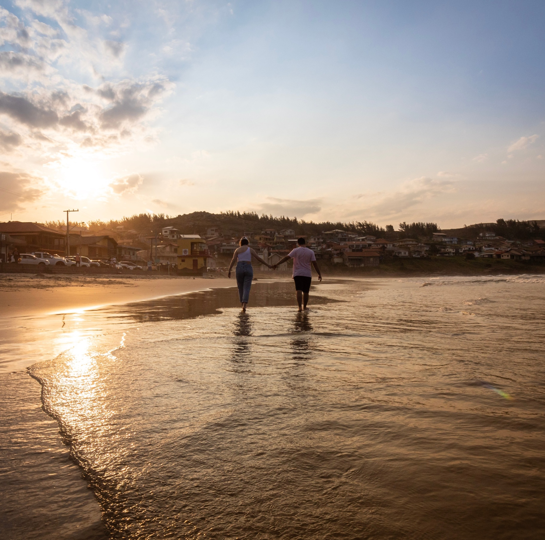 Image of a couple walking along the beach holding hands during sunset. Learn how to effectively cope and manage your seizures with the help of adult neuropsychological evaluations in Saint Petersburg, FL.